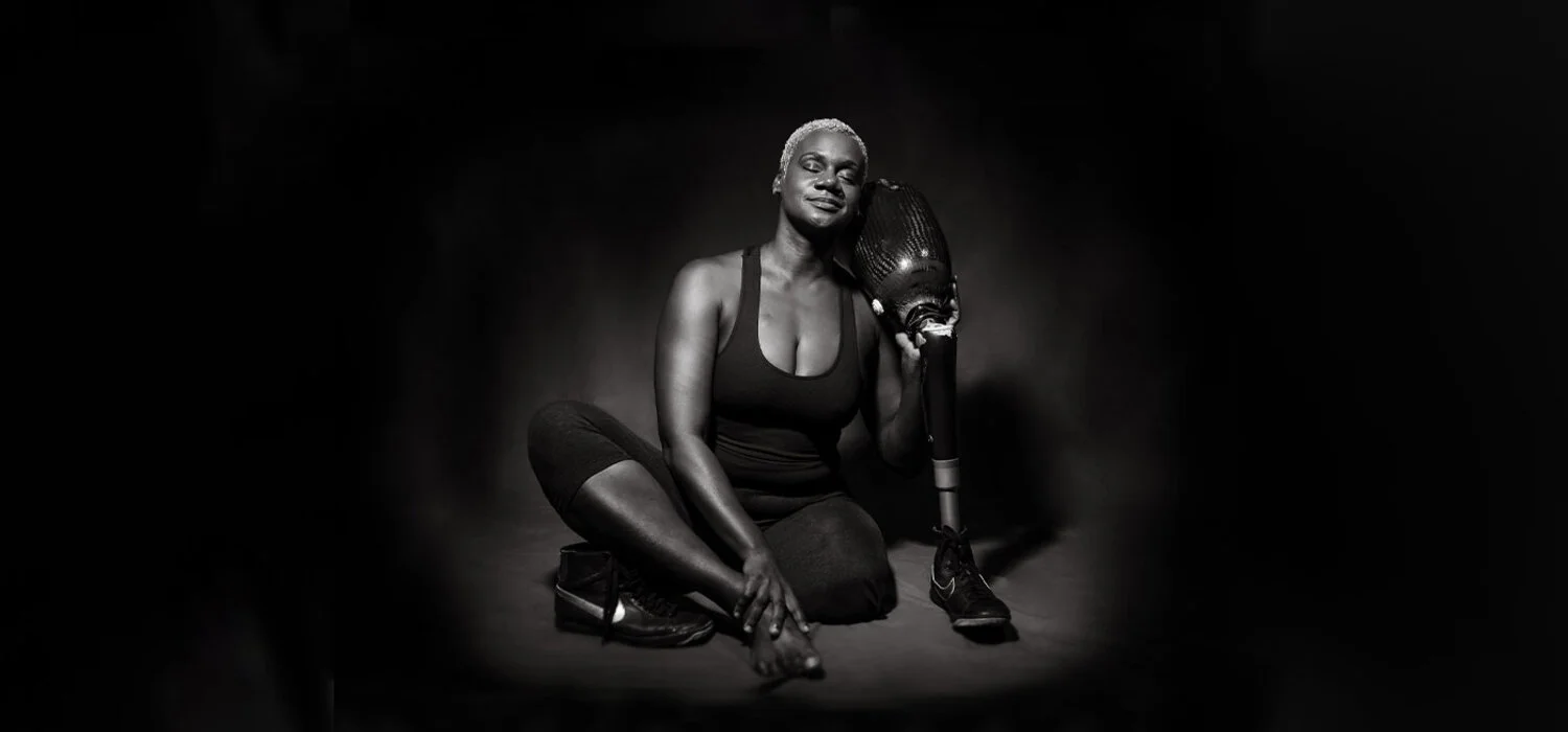 paho-erin-brown-bahamas-1400x700 erin brown with prosthetic leg sitting